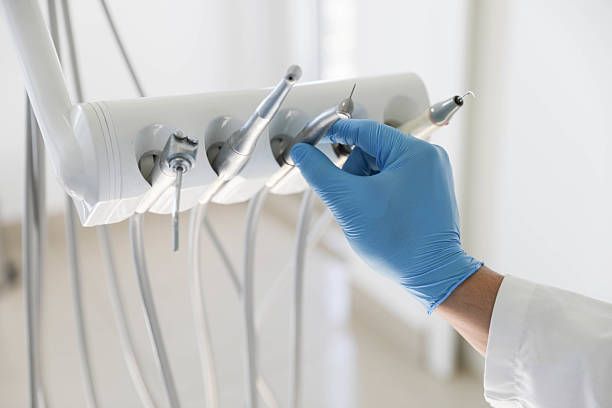 Professional Invisalign Clear Aligners technician working in Portland, ME